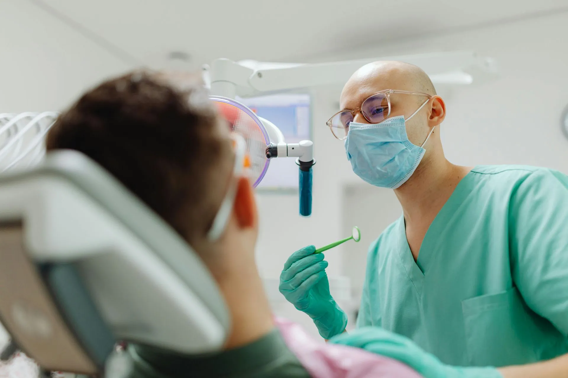 Dentist examining a patient