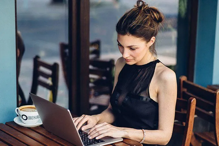 Billing professional working at a laptop