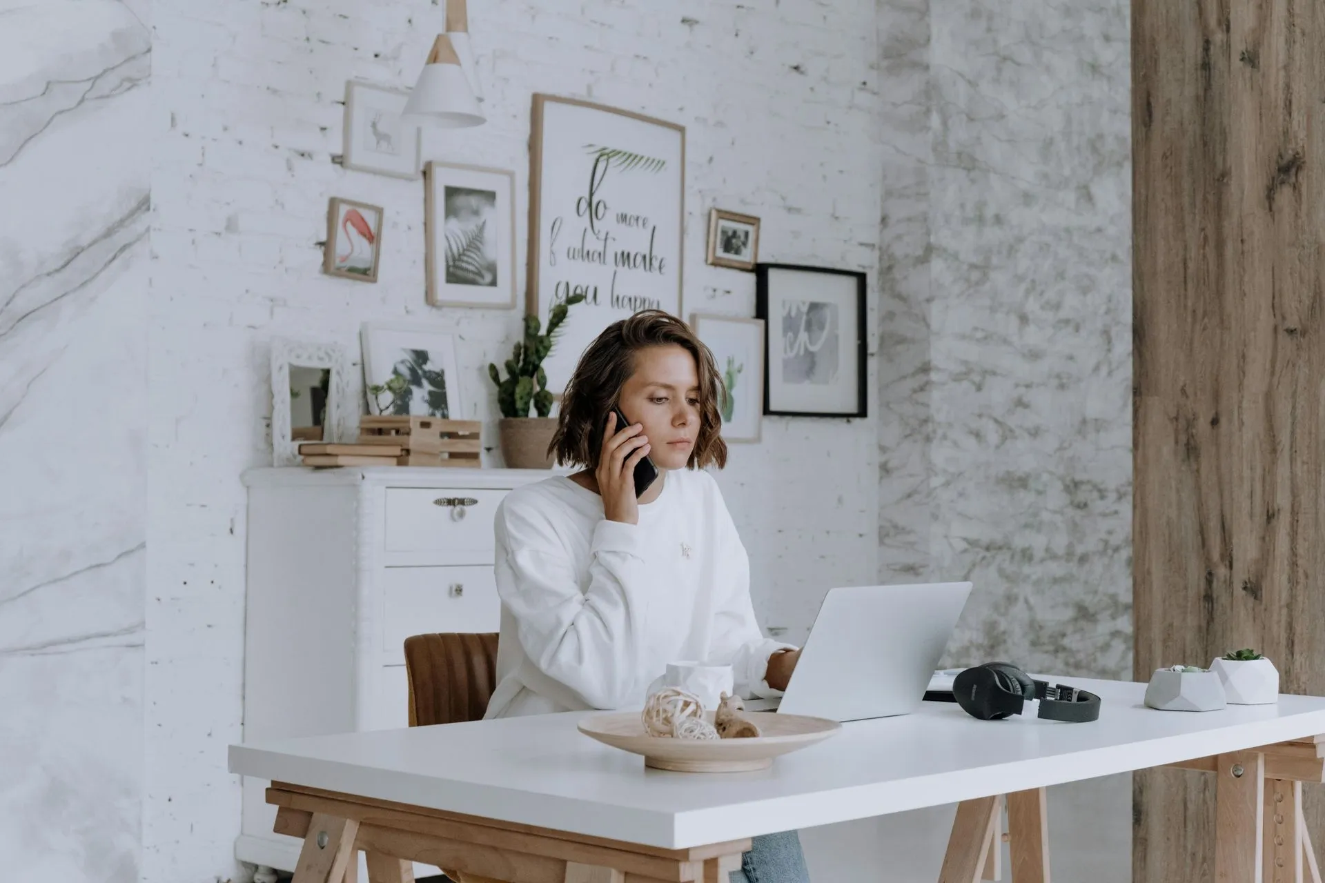Office professional managing follow-up at a laptop