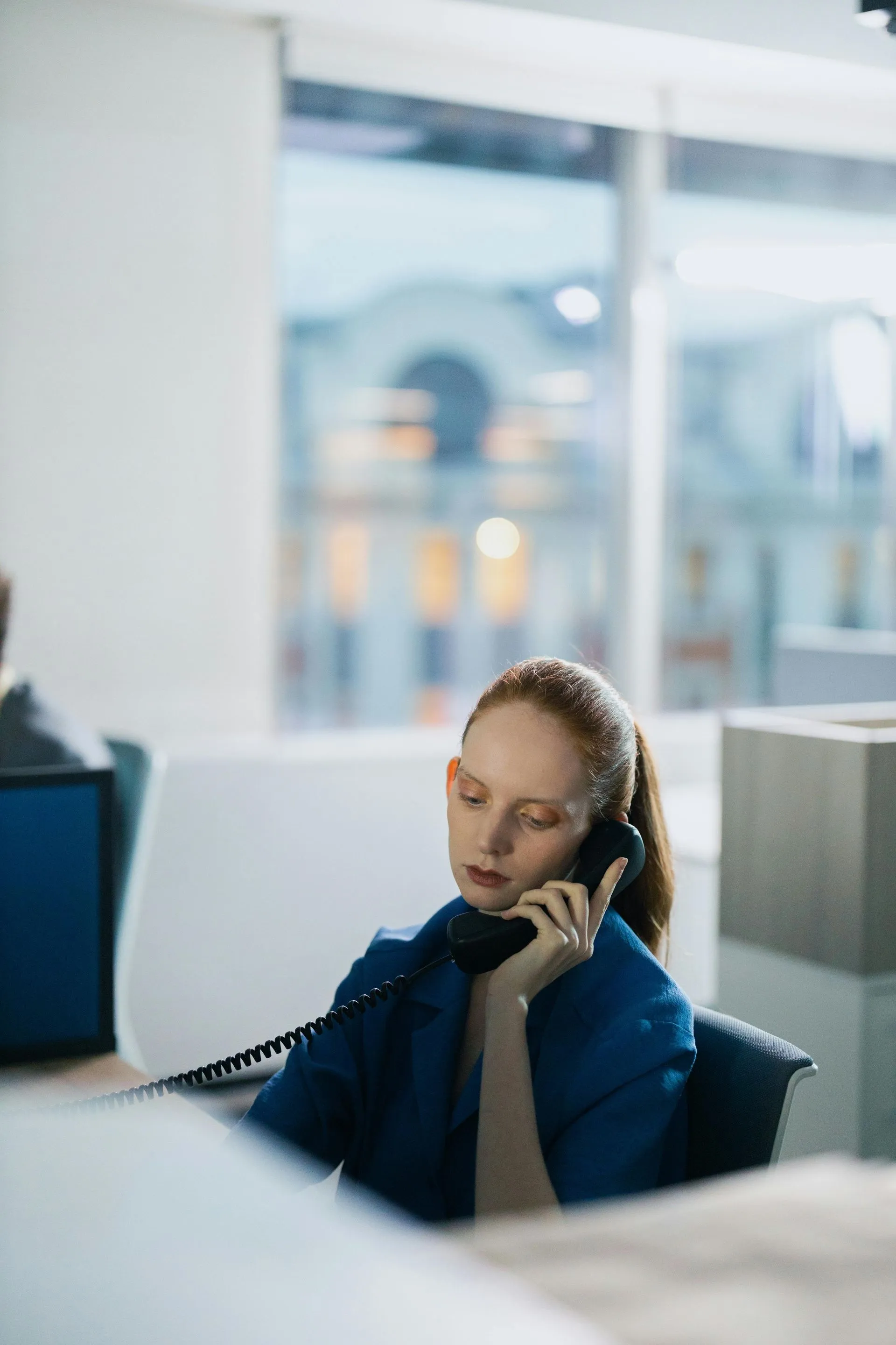 Dental office professional handling insurance calls