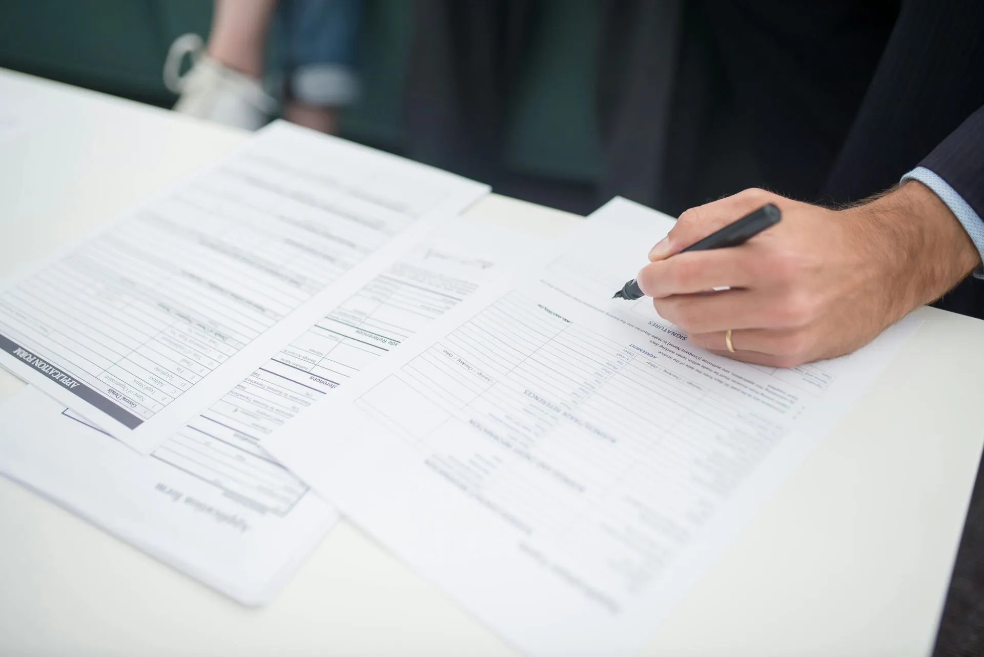 Office staff checking insurance documents