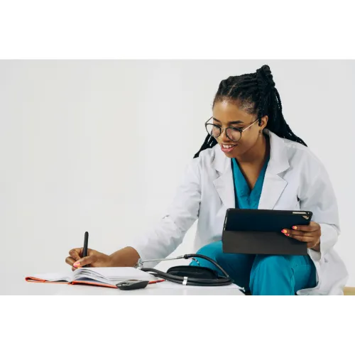 Healthcare professional completing insurance verification paperwork